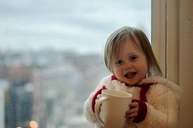 Jemma pretending to drink coffee