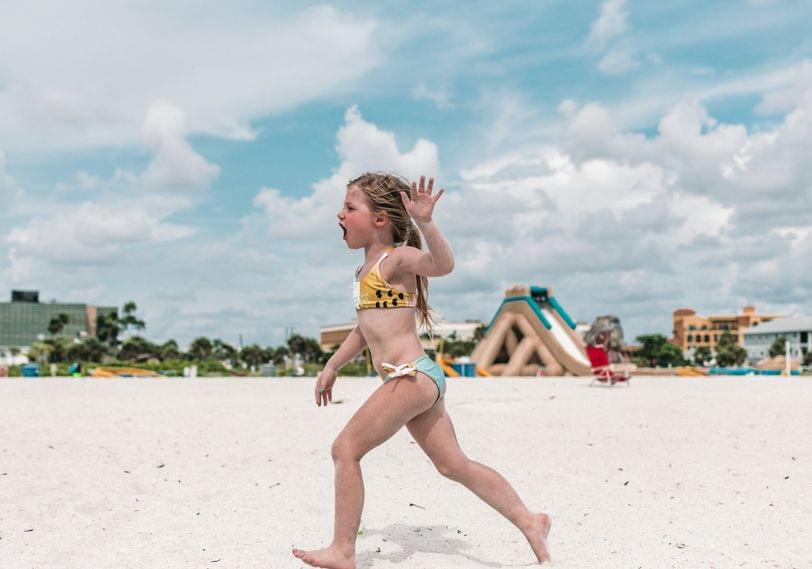 Cadence running in her KaiKini bikini