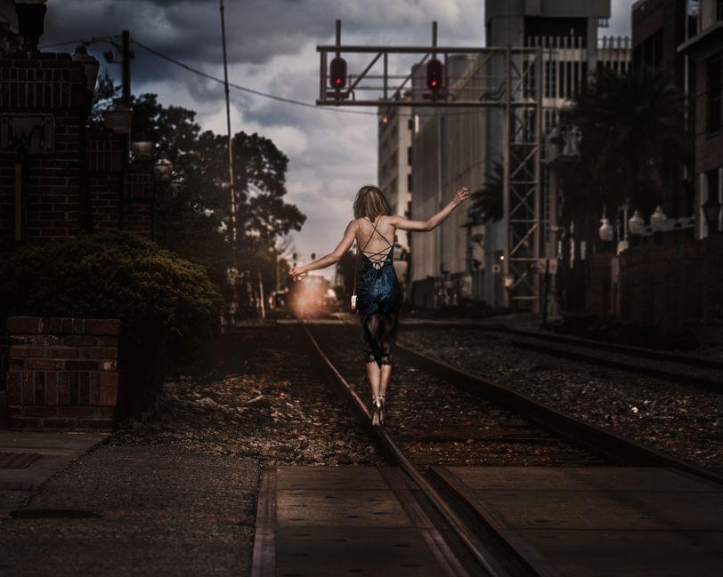 Topaz Valentine's Dress on train tracks