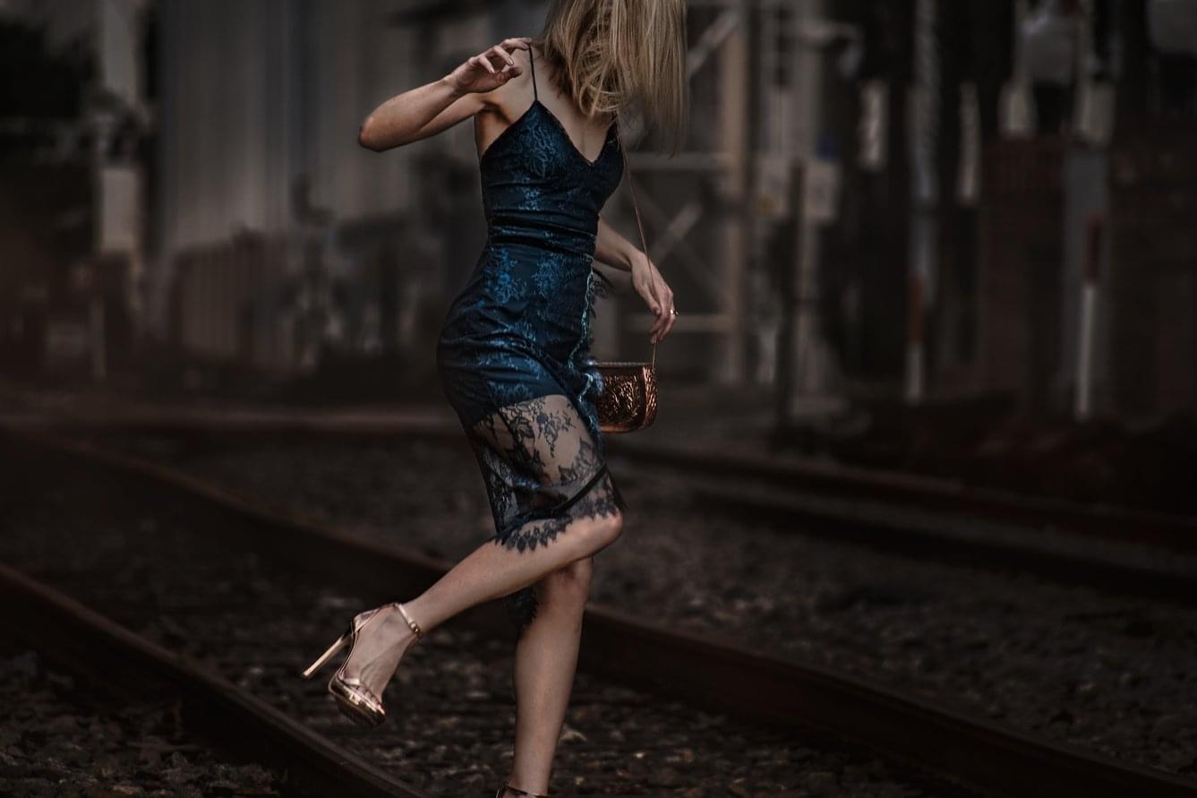 Topaz Valentine's Dress on train tracks