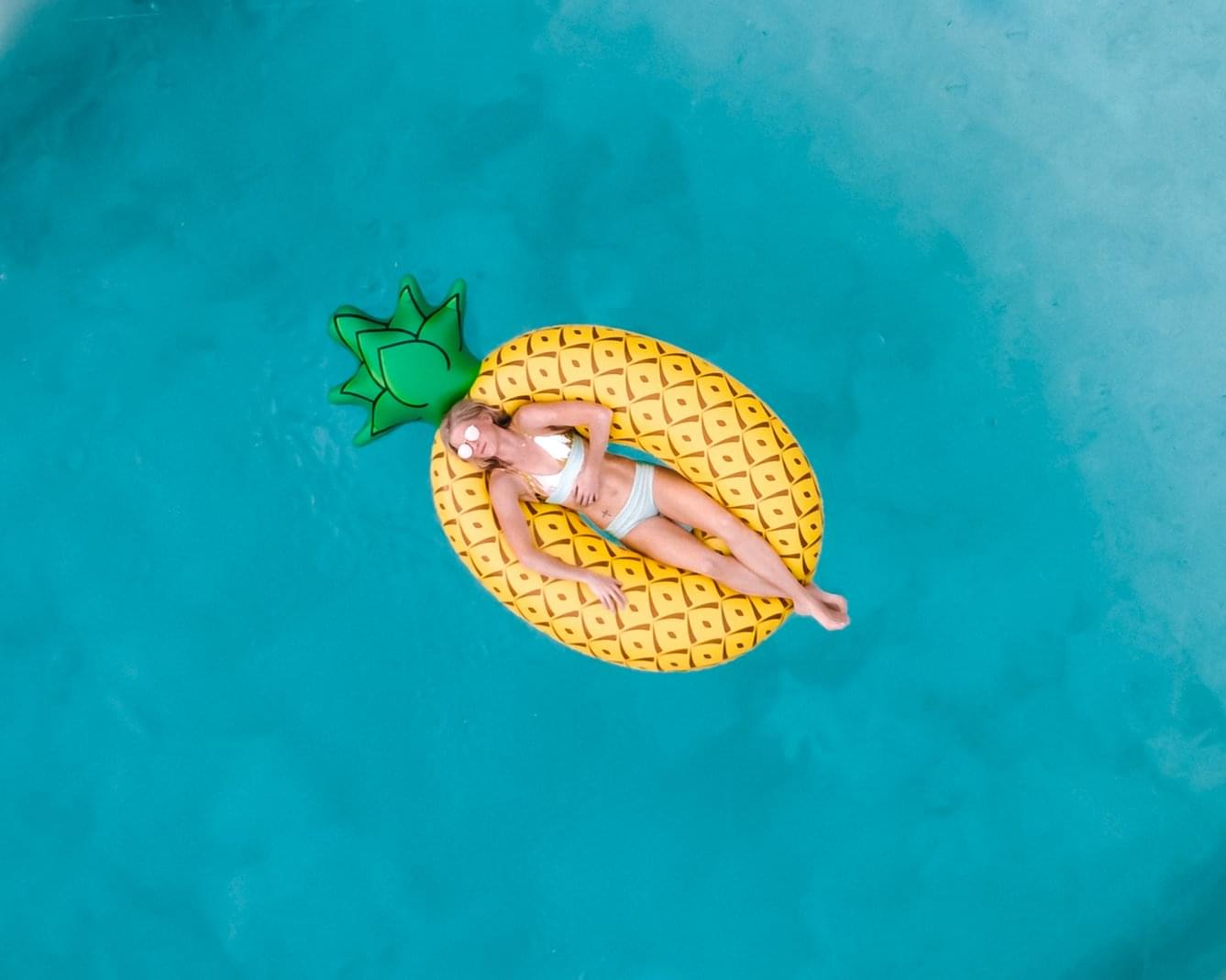 Floating on my pineapple pool float