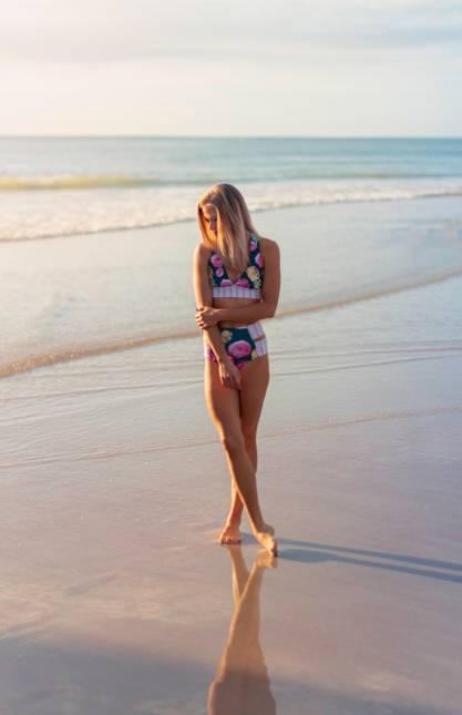 Jessica Hope in a bikini on the beach at golden hour